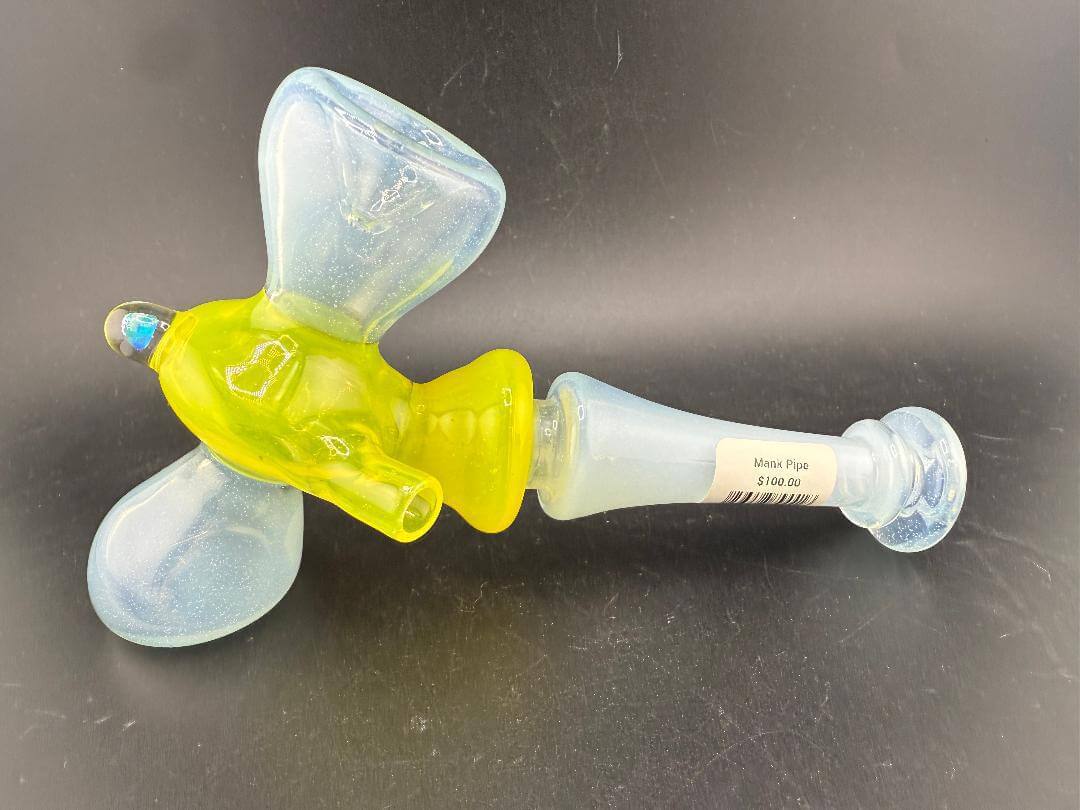 Mank Glass Hammer Pipe - Light Blue & Yellow w/ Encased Opal displayed from above on a dark background.