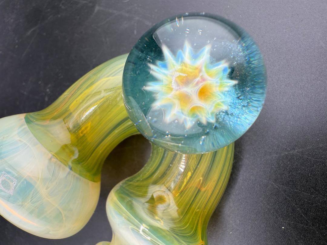 Mank Glass Sherlock Pipe - Green & Fumed Sherlock w/ Marble Implosion showing intricate marble design and vibrant colors.
