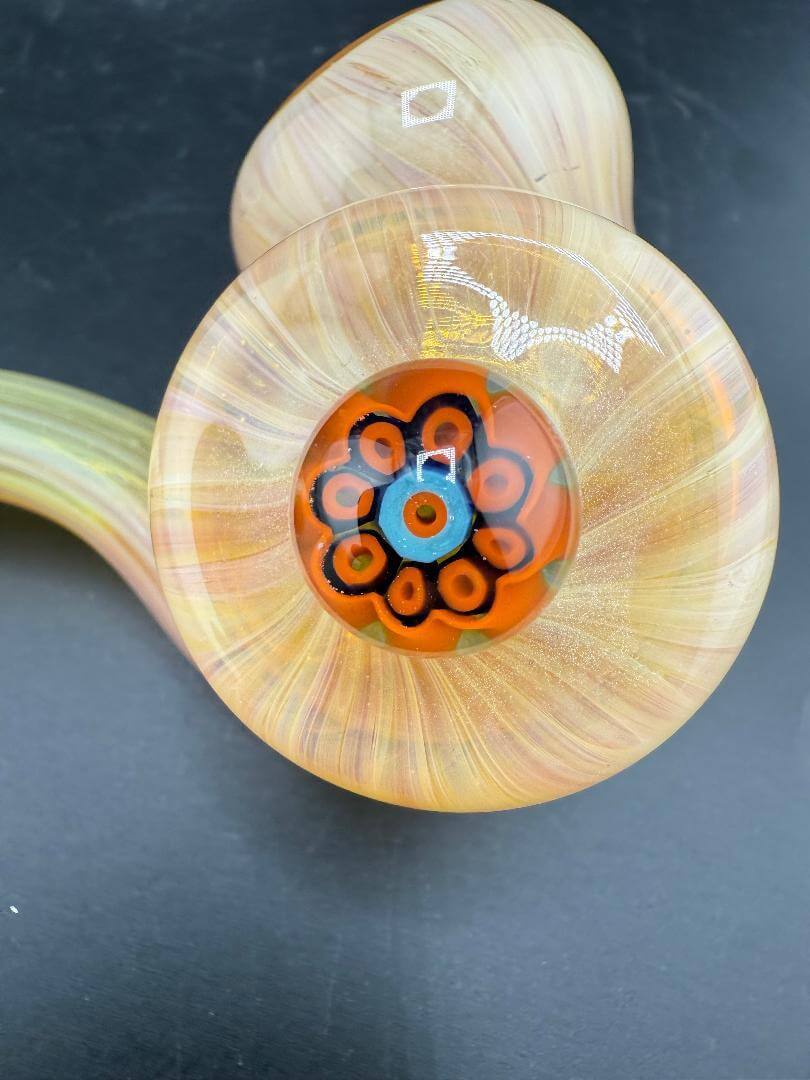 Mank Glass Sherlock Pipe - Peach Beige w/ Millie Pendant Attachment showcasing intricate design and warm tones.