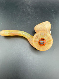 Mank Glass Sherlock Pipe - Peach Beige w/ Millie Pendant Attachment displayed on a black surface.