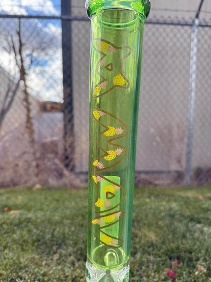 MAV Glass 18" Beaker - Ooze Pineapple with vibrant green and yellow design on durable borosilicate glass.