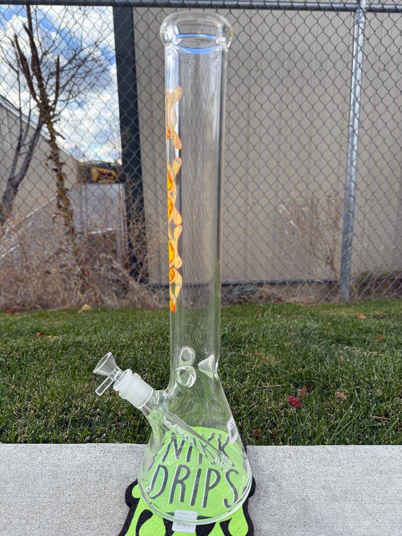 MAV Glass 18" Beaker 14mm 45° - Pineapple Lobster Beaker on grass with vibrant design and durable glass.