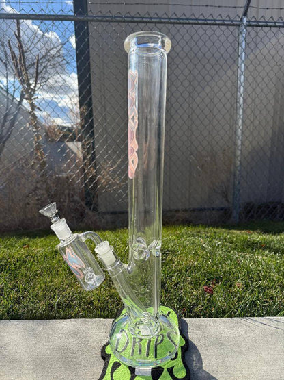 MAV Glass 18" Straight Tube Ash Catcher Combo 14mm 45° with a clear borosilicate design on a grassy surface.