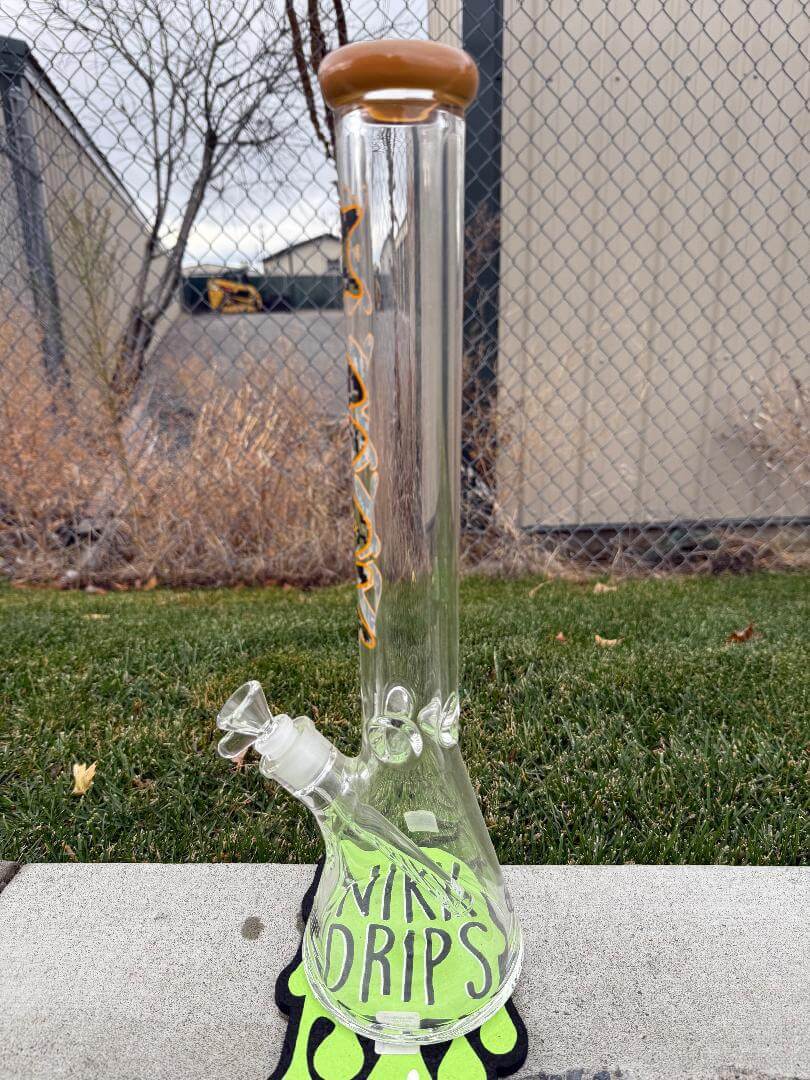 MAV Glass 9mm Thick 18" Beaker 14mm 45° - Digi Camo in a grassy outdoor setting.