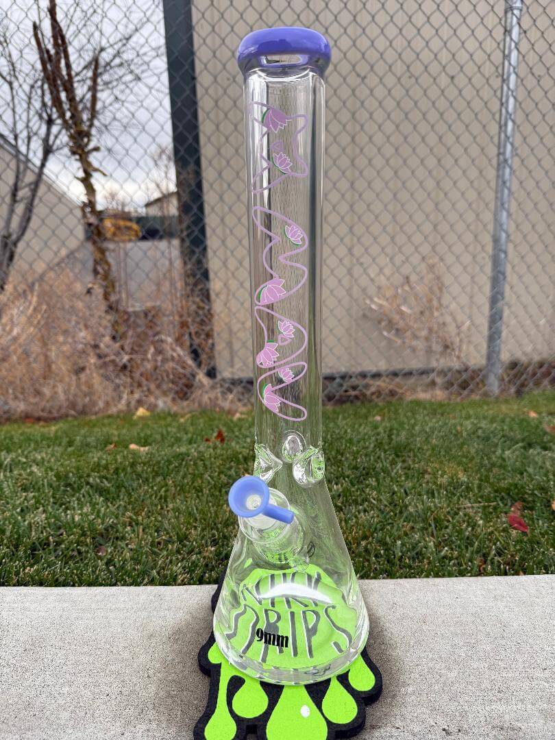 MAV Glass 9mm Thick 18" Beaker - Purple Lotus showcasing its elegant purple lotus design and durable borosilicate glass construction.