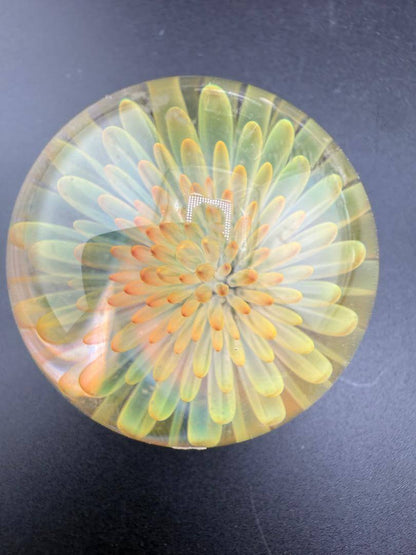 McDoogIe Glass Marble – 36mm Gold Fume Implosion featuring vibrant color shifts and deep internal craftsmanship.