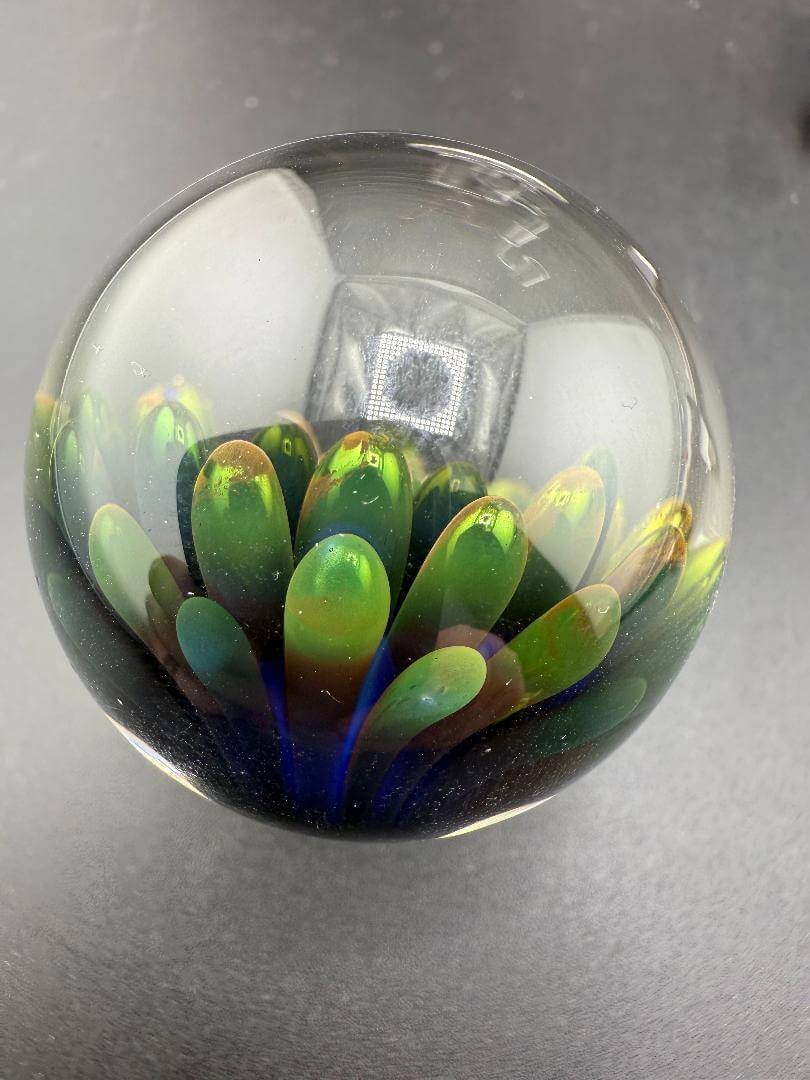 McDoogIe Glass Marble – 40mm Gold Fume Implosion with vibrant internal depth and color shifts.