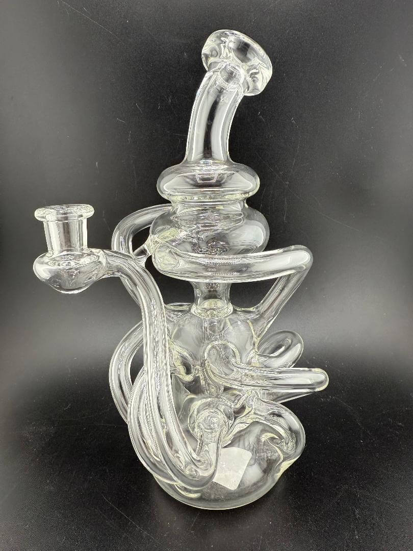 Mcdoogle Glass Clear Experimental Recycler 10mm 90° featuring intricate design and clear borosilicate glass.