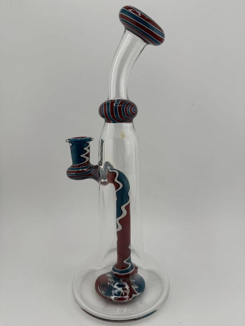 Mcdoogle Glass Clear Grateful Dead Theme Worked Rig in red, white, and blue colors with intricate detailing.