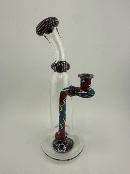 Mcdoogle Glass Clear Grateful Dead Worked Rig in red, white, and blue with intricate detailing, highlighting handcrafted artistry.