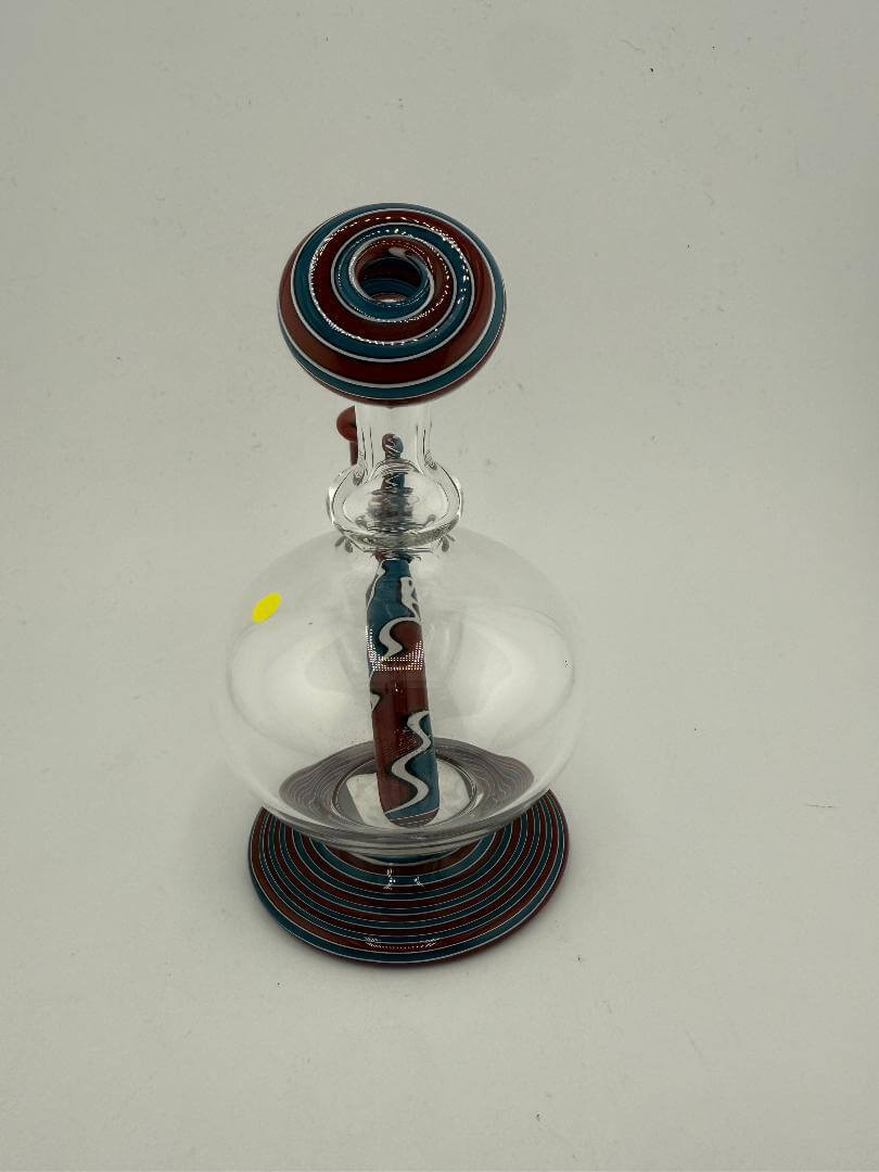 Mcdoogle Glass Clear Grateful Dead Theme Worked Rig Orb in red, white, and blue, showcasing handcrafted details.