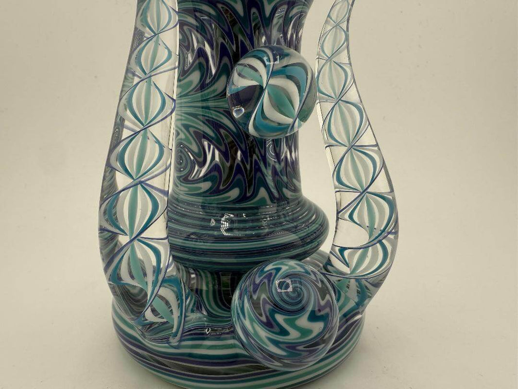 Mcdoogle Glass Fully Worked Rig in Ice Blue colorway featuring intricate wig wag design and spherical accents