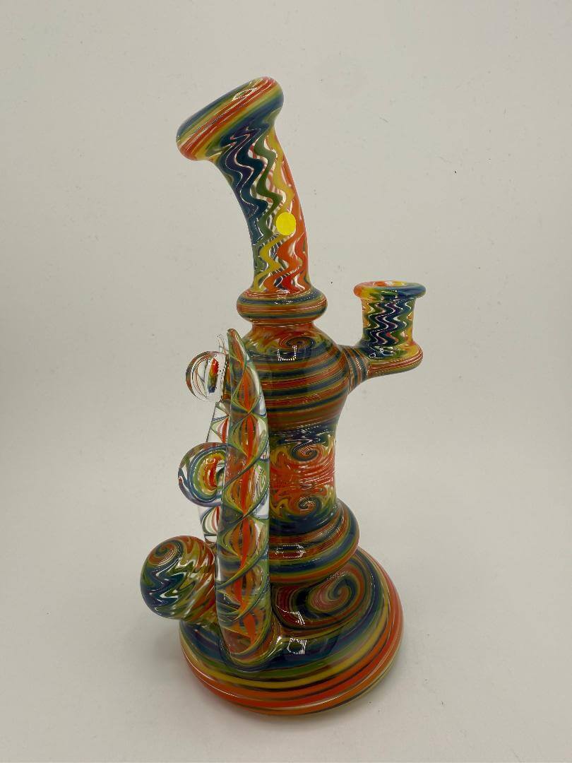 Mcdoogle Glass Fully Worked Rainbow Wig Wag Rig, 10mm 90° with vibrant swirling colors and intricate design.