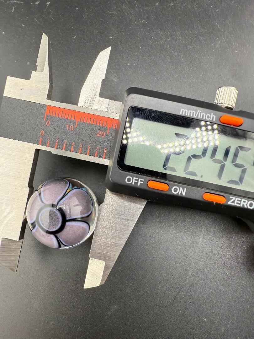 Mcdoogle Glass Marble - 22mm No Fume Fume Tech w/ Purple Flower Dot Stack Backer measured with calipers