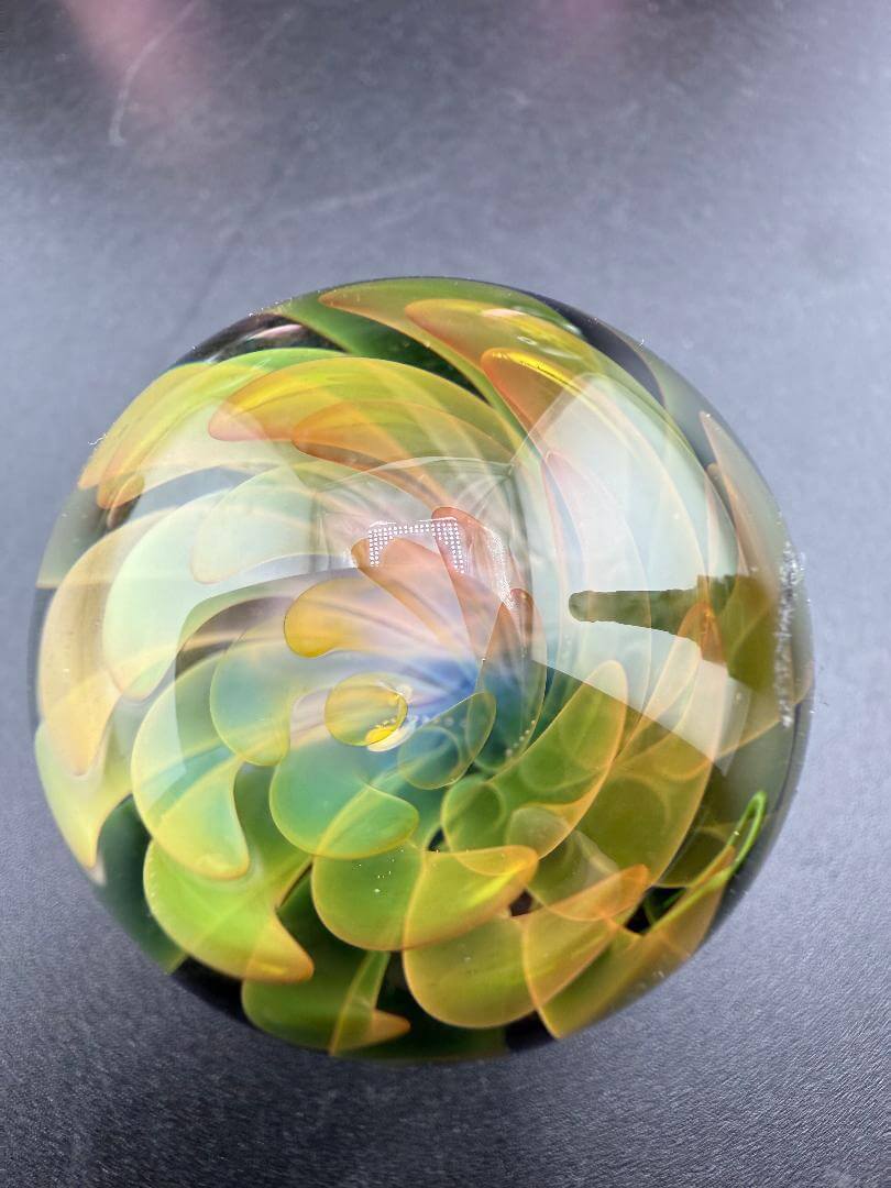 Mcdoogle Glass Marble - 30mm Fume Implosion featuring vibrant colors and depth.