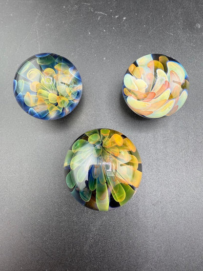 Mcdoogle Glass Marble - 31mm Fume Implosion handcrafted glass marbles showcasing vibrant fume implosion designs.