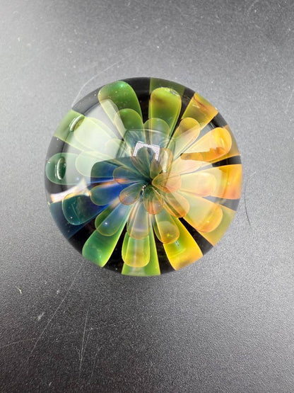 Mcdoogle Glass Marble - 31mm Fume Implosion with vibrant colors and intricate design.