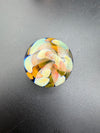Mcdoogle Glass Marble - 31mm Fume Implosion showcases vibrant colors and intricate depth in a handcrafted design.
