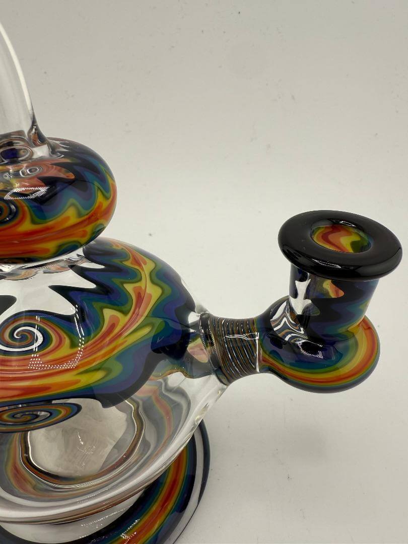 Mcdoogle Glass Rainbow Line Worked Ball Rig 10mm, vibrant design, swirling colors, precision handblown craftsmanship.