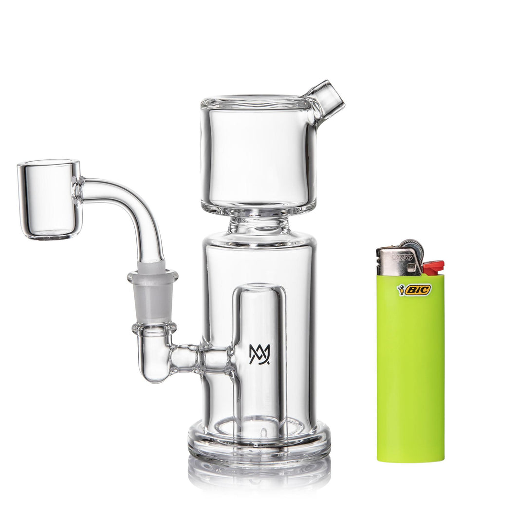 MJ Arsenal Column Mini Rig next to a green Bic lighter for scale, showcasing its sleek design and compact size.
