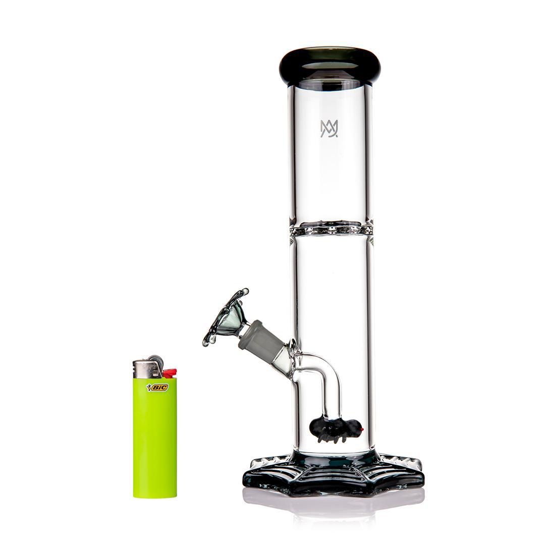 MJ Arsenal Widowmaker 14mm 45° bong next to a lighter, showcasing its spiderweb design and percolator.