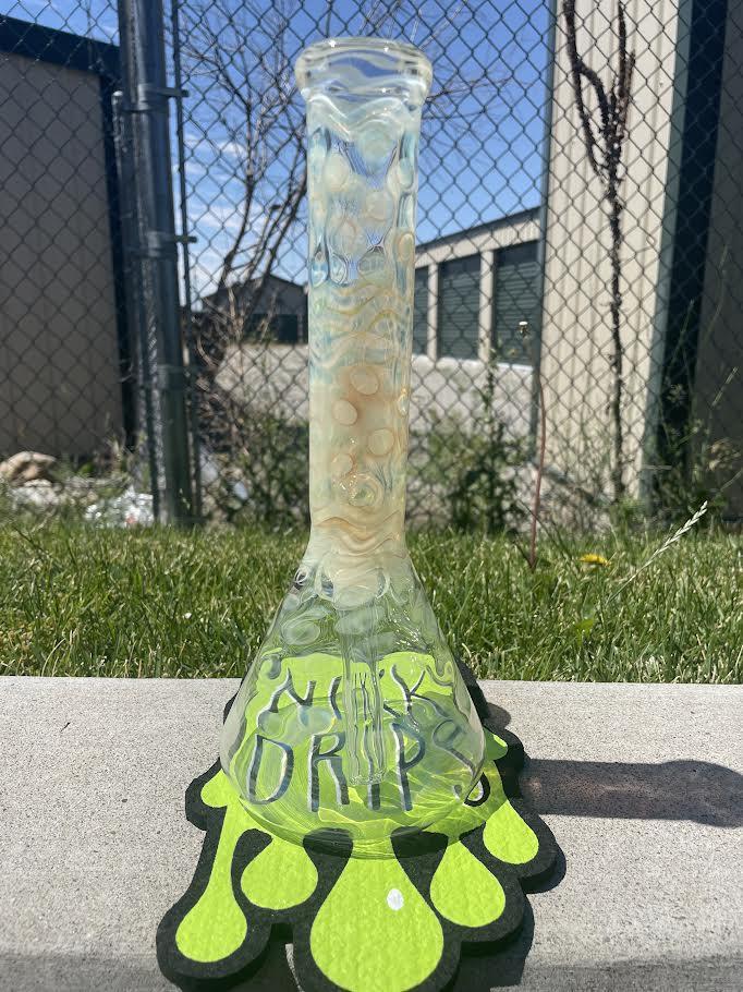 silver fume flower beaker 14mm with colorful patterns on a bright base in a natural outdoor setting