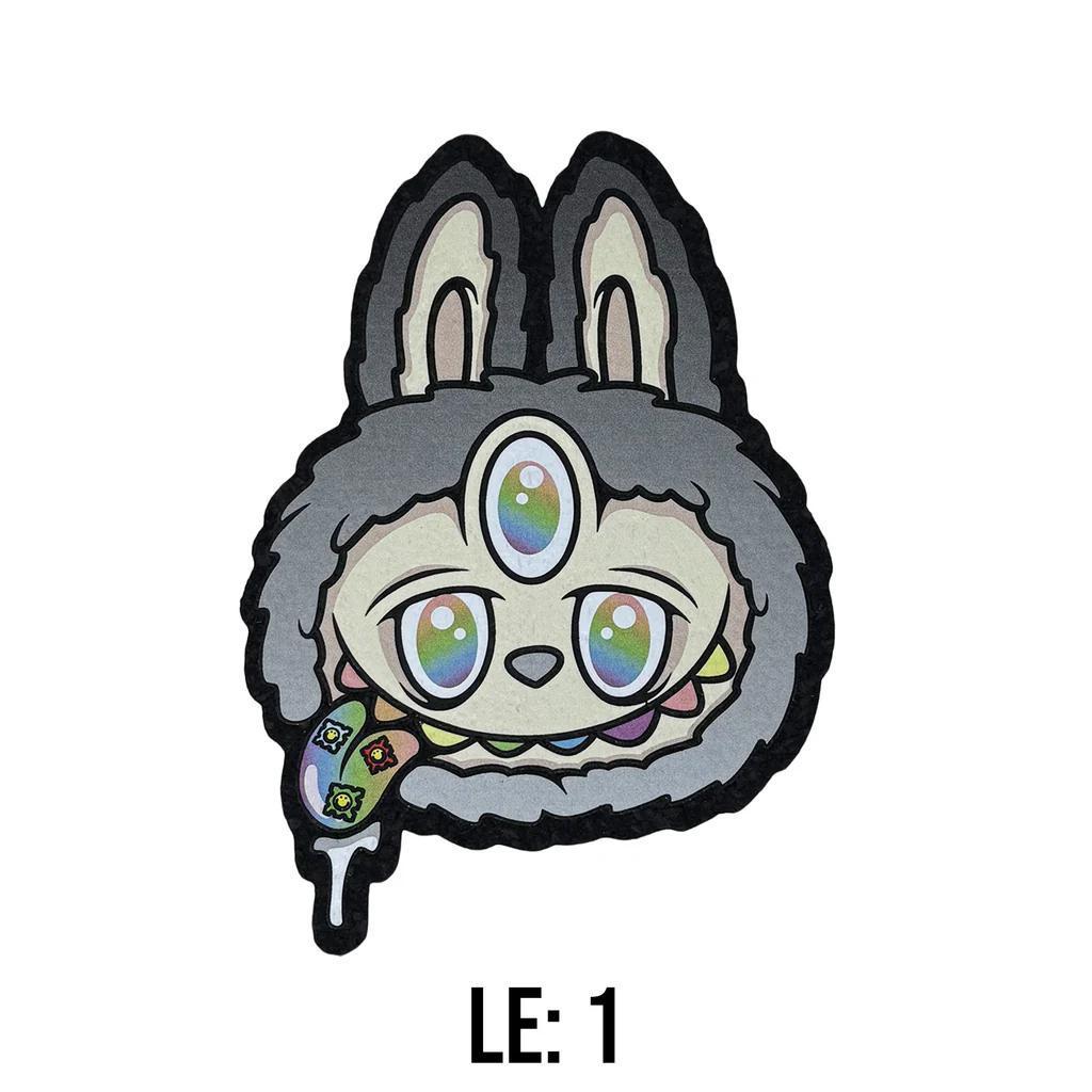 Moodmats  x Born ready Designs Lamumu Blind Bag Psyched Series Limited Edition 1 mat with a colorful rabbit design.