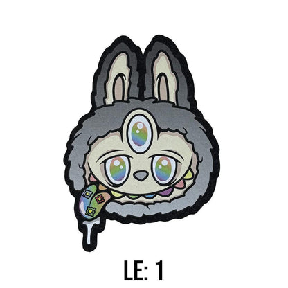 Moodmats  x Born ready Designs Lamumu Blind Bag Psyched Series Limited Edition 1 mat with a colorful rabbit design.