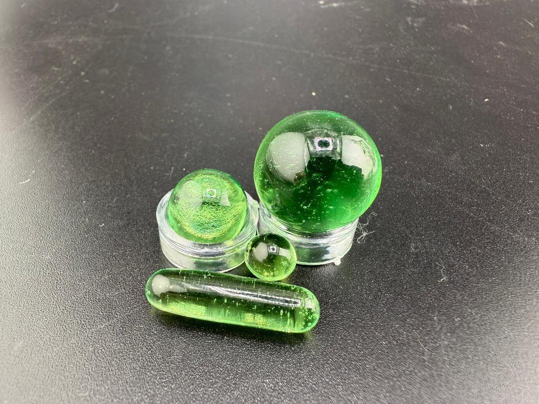 Mop Head Glass Slurper Quartz Terp Pearl Set in green, handcrafted for dabbing, featuring various sized spherical pearls.