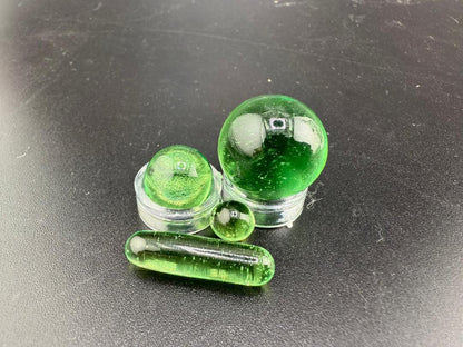 Mop Head Glass Slurper Quartz Terp Pearl Set in green, handcrafted for dabbing, featuring various sized spherical pearls.
