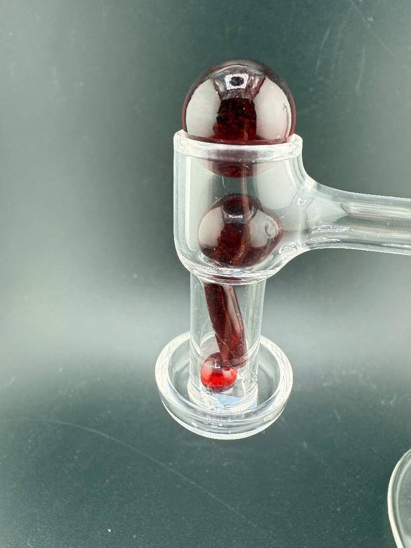Close-up of Mop Head Glass Slurper Quart Terp Pearl Set showing unique design and craftsmanship.