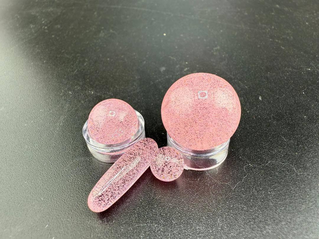 Mop Head Glass Slurper Quartz Terp Pearl Set in pink, handcrafted for smooth dabbing, featuring multiple unique pieces.