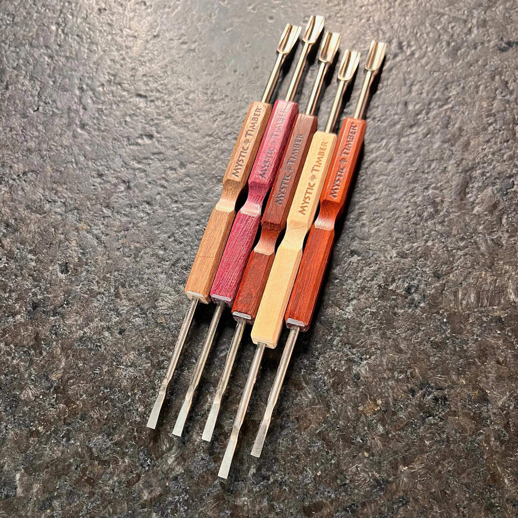 Mystic Timber Blade & Pic Double Dabber tools featuring hardwood handles and titanium tips for precise handling.