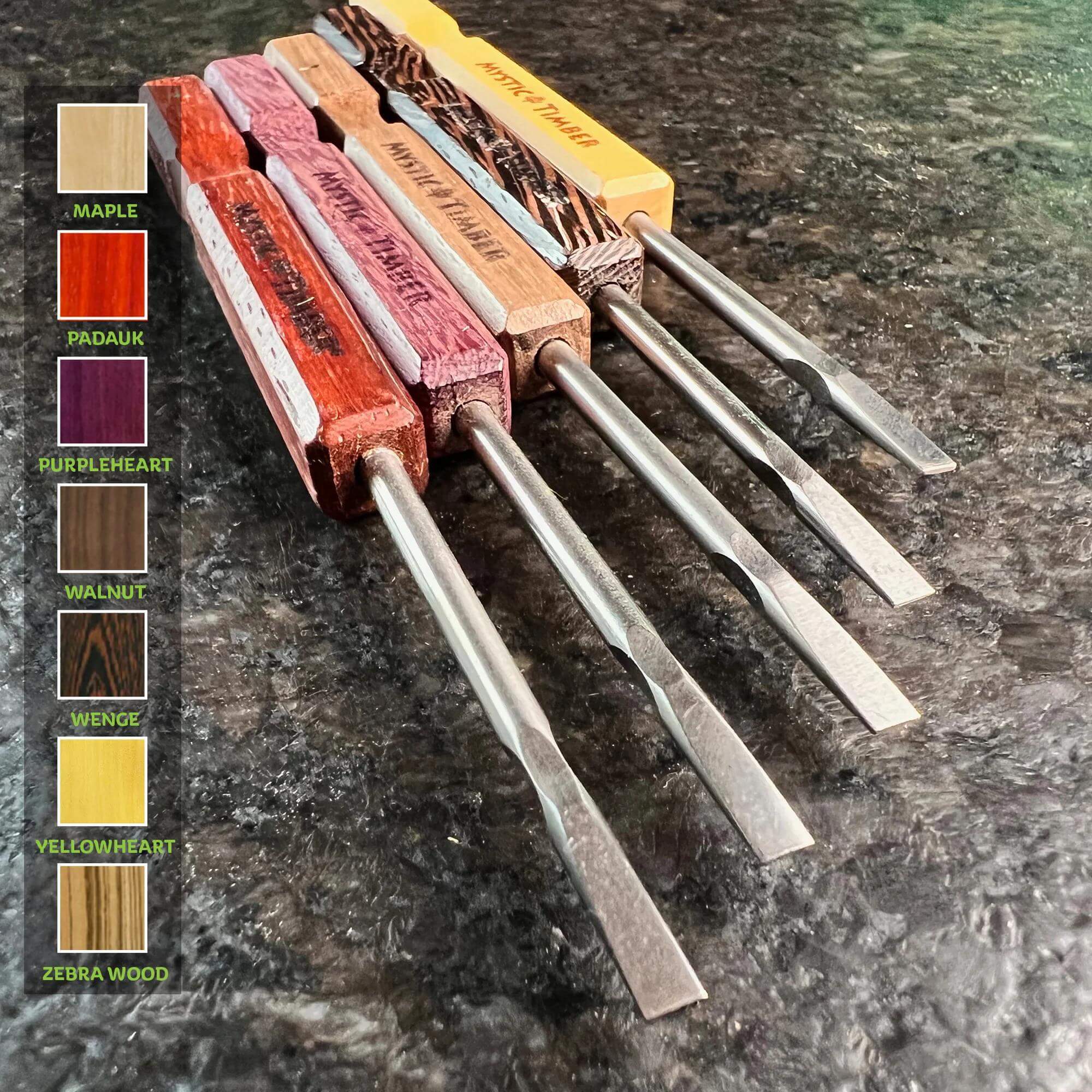 Mystic Timber Dab Tool - Long Handled Flat Shovel assortment of vibrant wood handles on a counter.