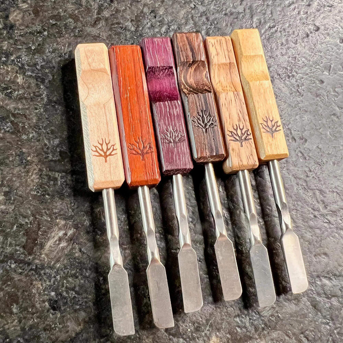 Mystic Timber Dab Tool - Pocket Blade collection of various colors and designs of portable concentrate tools.