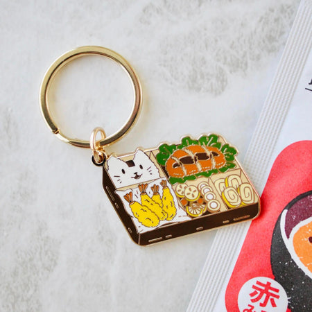 Occasionalish Keychain - Bento Box featuring a cute cat design with fried pork cutlet, tempura shrimp, and veggies.