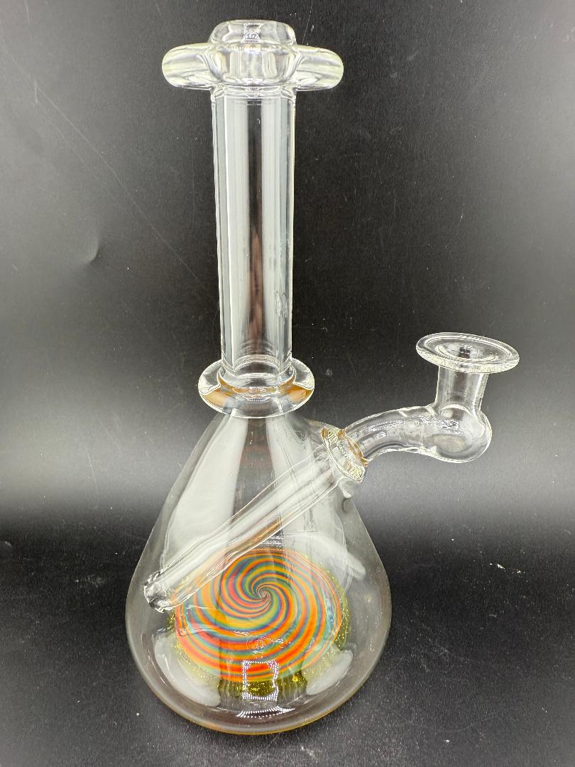 OG Badger Glass Worked Bottom Beaker Banger Hanger 10mm 90° displayed with a colorful spiral design inside.