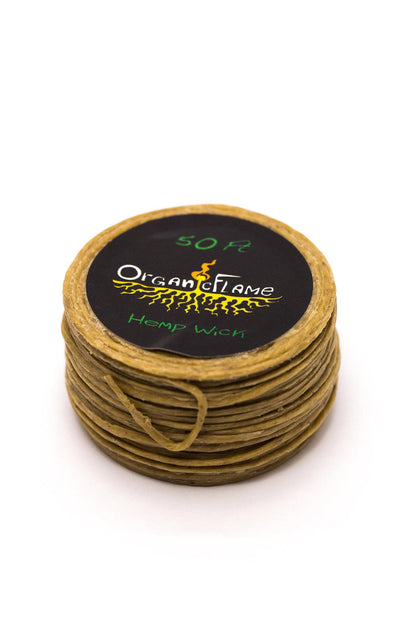 Organic Flame Hemp Wick roll on a white background, showcasing 50ft of natural hemp and beeswax wick.