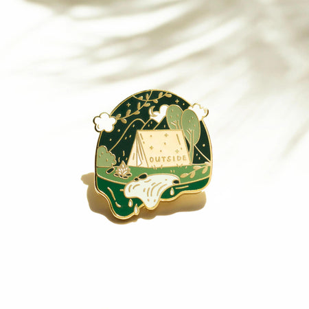 Occasionalish Enamel Pin - Campsite featuring a tent and greenery with the text 'OUTSIDE'.