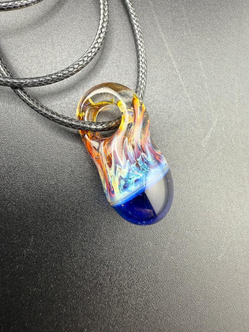 Pablos Glass Giblets Neckless Pendant featuring colorful fumed chaos design on a black background.