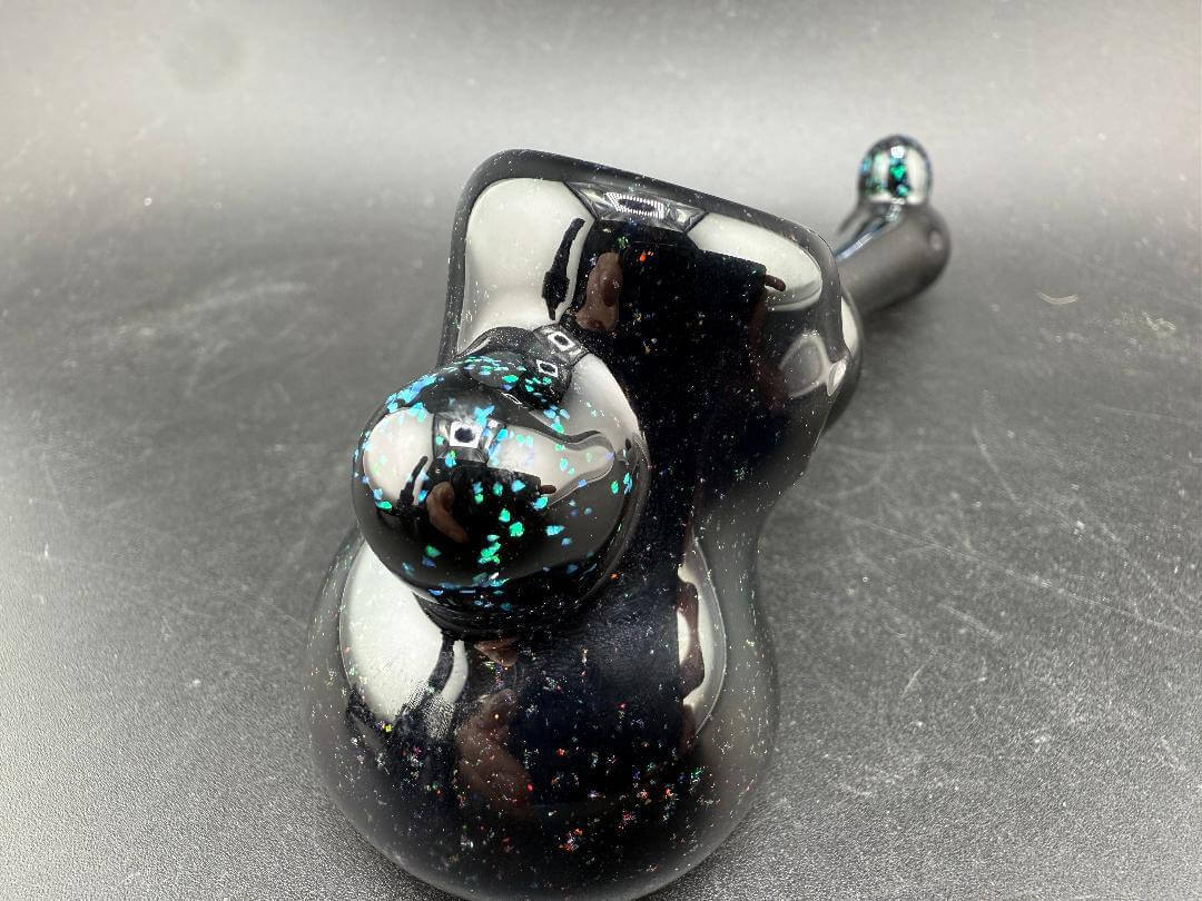 Paul Smith Glass Hammer Pipe - Black w/ Crushed Opal showcased on black background with vibrant details.