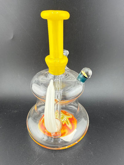 Paul Smith Glass Horned Wig Wag Rig 10mm 45° in yellow and orange with vibrant wig wag design at Nikk Drips.