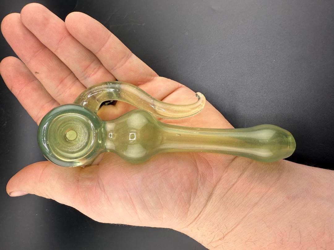 Paul Smith Hammer Pipe - CFL Purple to Green Crushed Opal Dry Pipe w/ Horn held in hand.