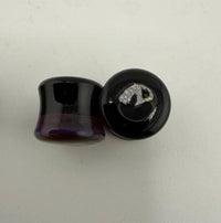 Paulson Pieces 10mm ear plugs made of handcrafted borosilicate glass, showcasing unique colors and artistic design.