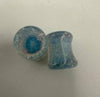 Paulson Pieces 8mm ear plugs in blue crushed opal style, handcrafted borosilicate glass from Spokane, WA.