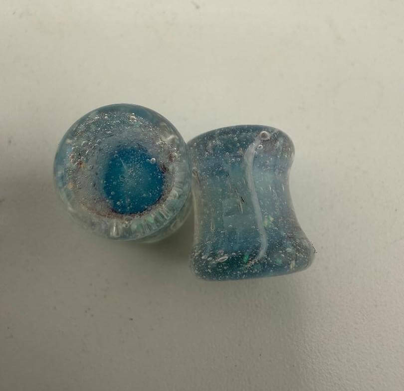 Paulson Pieces 8mm ear plugs in blue crushed opal style, handcrafted borosilicate glass from Spokane, WA.