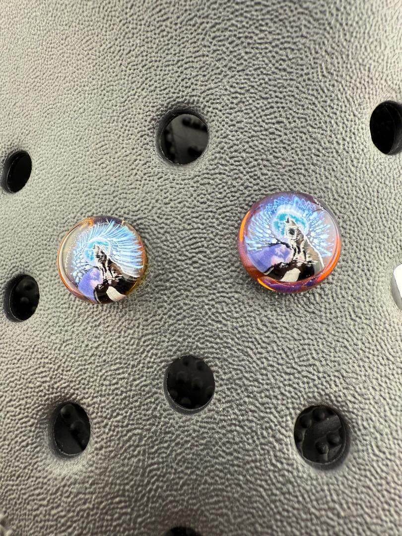 Detail shot of Millie Kroc giblets, vibrant glass accessories featuring pop culture designs, handcrafted in Spokane.