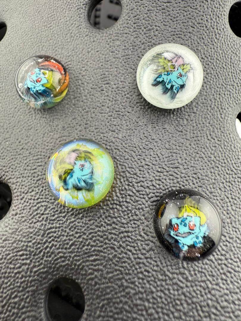 Colorful glass giblet accessories featuring pop culture icons, crafted with precision in Spokane, WA