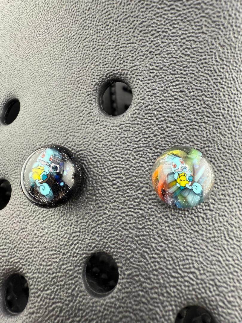 Handcrafted Paulson Pieces Glass Kroc Giblets showcasing vibrant pop culture designs in detailed glass form.