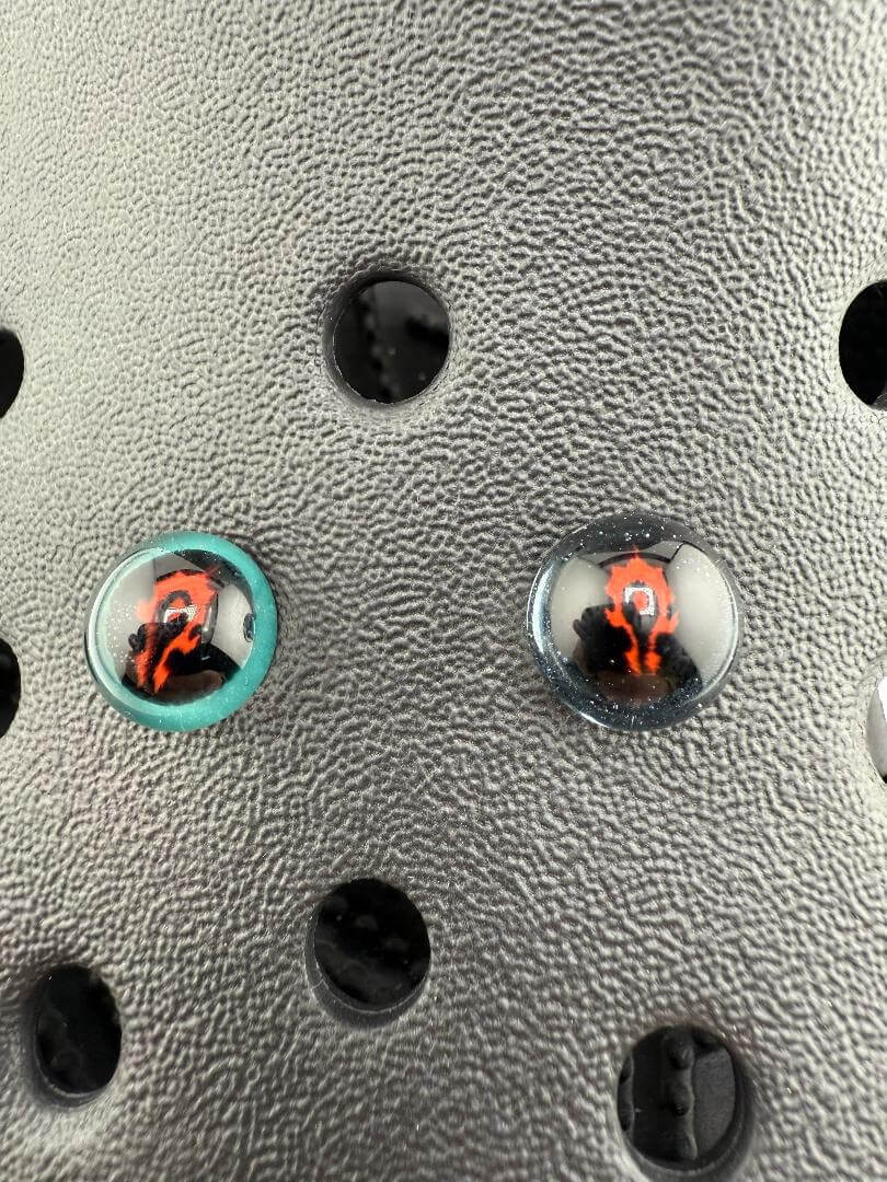 Close-up of Paulson Pieces glass Kroc giblets featuring pop culture design, handcrafted in Spokane, WA.